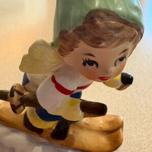 Lefton Skier Figurine with Green and Yellow Accents